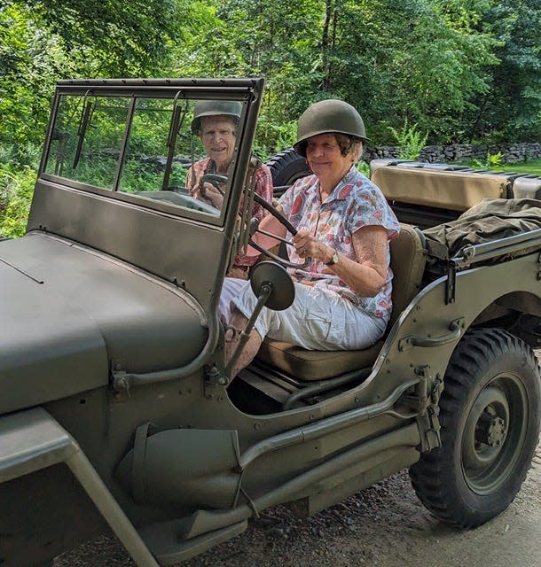 Author Carole Gariepy driving with her husband Gerry in 1942 Army Jeep