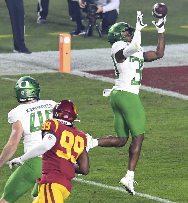 Ducks defend Pac-12 crown with 31-24 win over USC - The Columbian