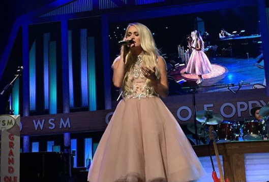 Carrie Underwood took the stage at the Opry in a pink princess dress. (Photo: Instagram/opry)