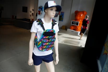A mannequin is seen wearing a bullet proof vest as part of an art installation by artist WhIsBe titled "Back to School Shopping" to illustrate the dangers of gun violence in schools, at a gallery in New York City