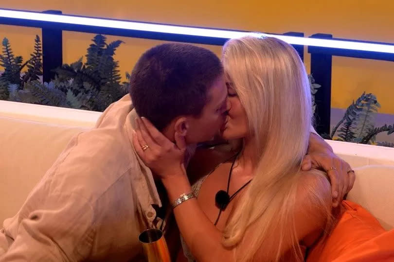 Joey and Grace snogging