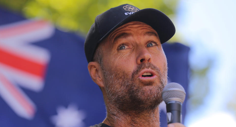 Celebrity chef Pete Evans speaks during an anti-vaccination rally in Sydney in February 2021.