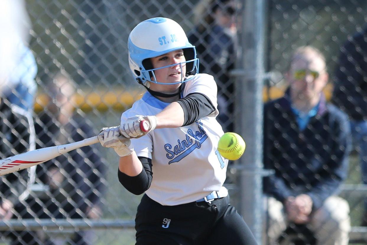 Saint Joseph batter Savannah Hamilton (18) watches the pitch during the Bremen-Saint Joseph girls softball game Monday, April 24, 2023, at Northfield Complex in South Bend.