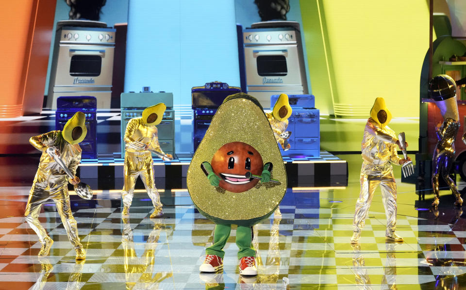 THE MASKED SINGER: Avocado in the “Comedy Roast Night” episode of THE MASKED SINGER airing Wednesday, Nov. 16 (8:00-9:02 PM ET/PT) on FOX. © 2022 FOX Media LLC. CR: Michael Becker / FOX.