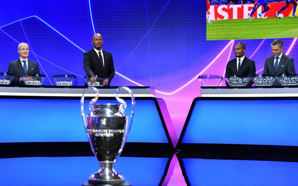 UEFA Head of Club Competitions Michael Heselschwerdt during the UEFA Champions League group stage draw at the RTS studios in Geneva - AFP