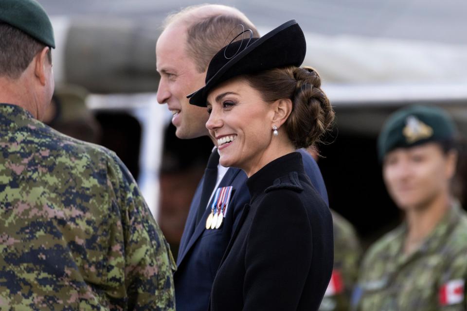 Prince William, Prince of Wales and Catherine, Princess of Wales meet with military personnel during a visit to Army Training Centre Pirbright on September 16, 2022 in Guildford, England. The Prince and Princess of Wales are visiting the training centre to meet troops from the Commonwealth who have been deployed to the UK in order to take part in the funeral of Queen Elizabeth II,which will take place on September 19.