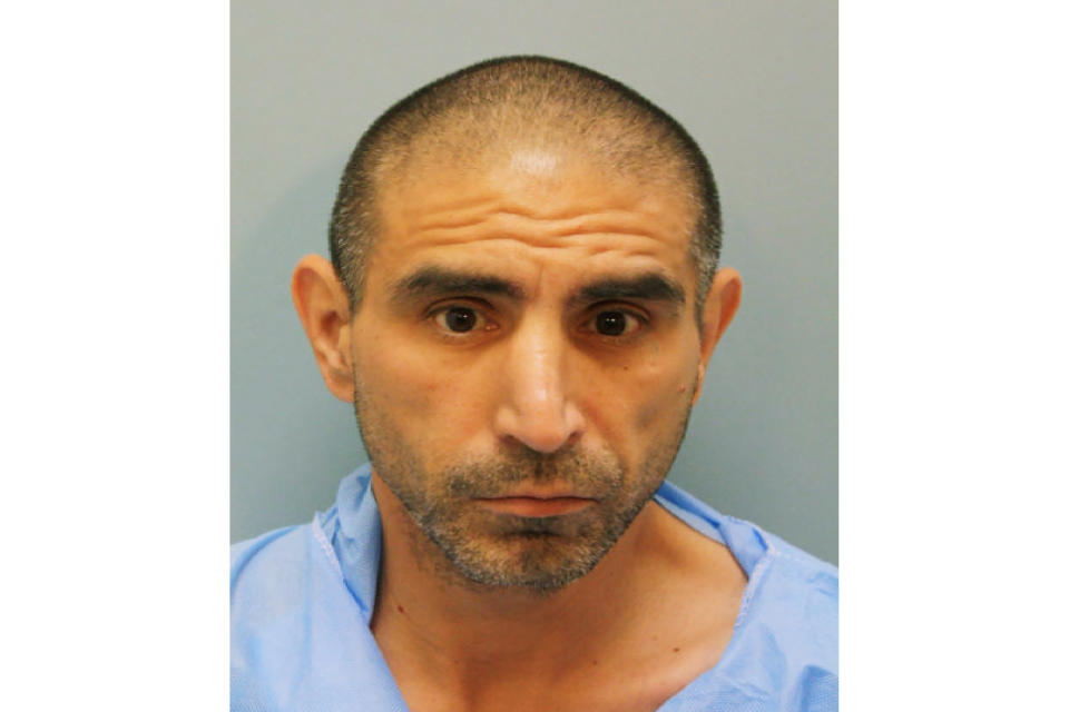 In this booking photo provided by Harris County Sheriff’s Office is Robert Solis. Solis, 47, of Houston has been charged with capital murder in the Friday, Sept. 27, 2019, shooting death of Harris County Sheriff's Deputy Sandeep Dhaliwal, 42, during a traffic stop near Houston. (Harris County Sheriff’s Office via AP)