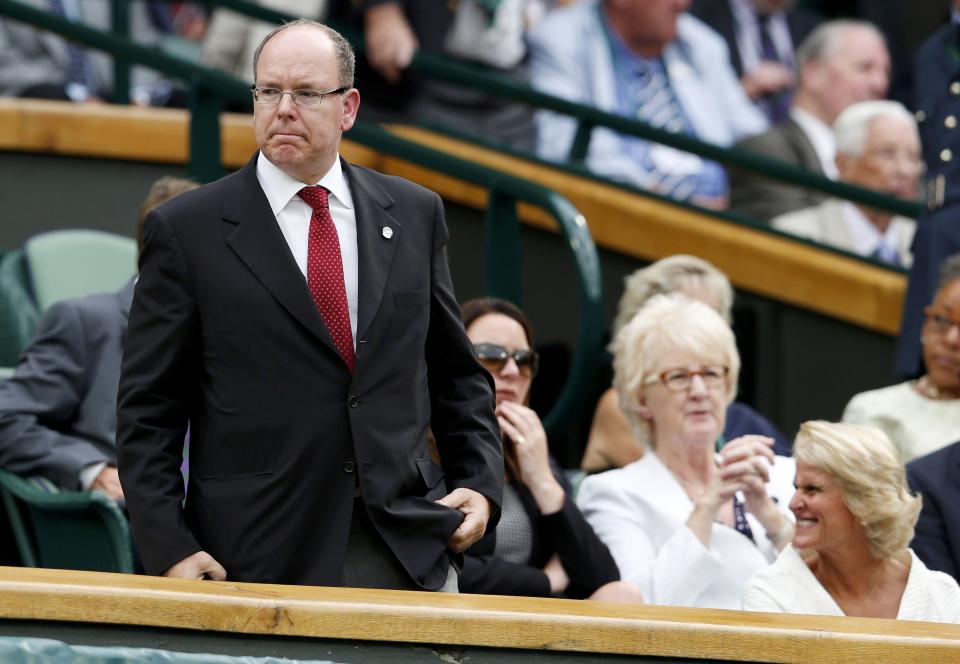 Prince Albert of Monaco in the royal box during the match between Andy Murray of Britain and Vasek Pospisil of Canada at the Wimbledon Tennis Championships in London, July 8, 2015. REUTERS/Suzanne Plunkett
