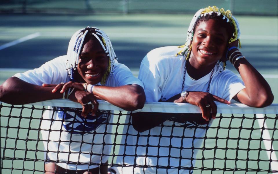 16 Jan 1998 - Teenage tennis sisters from America, Venus (left) and Serena Williams take time off a practise session to pose together during the Adidas International event at White City in Sydney, Australia - GETTY IMAGES