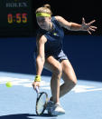 Karolina Muchova of the Czech Republic hits a backhand return to Australia's Ash Barty during their quarterfinal match at the Australian Open tennis championship in Melbourne, Australia, Wednesday, Feb. 17, 2021.(AP Photo/Andy Brownbill)