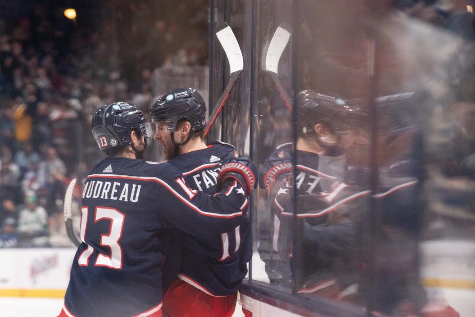 Dec 29, 2023; Columbus, Ohio, USA;
Columbus Blue Jackets left wing Johnny Gaudreau (13) celebrates with Adam Fantilli (11) after he made the game tying goal making it 5-5 going into overtime against the Toronto Maple Leafs during the third period of their game on Friday, Dec. 29, 2023 at Nationwide Arena.