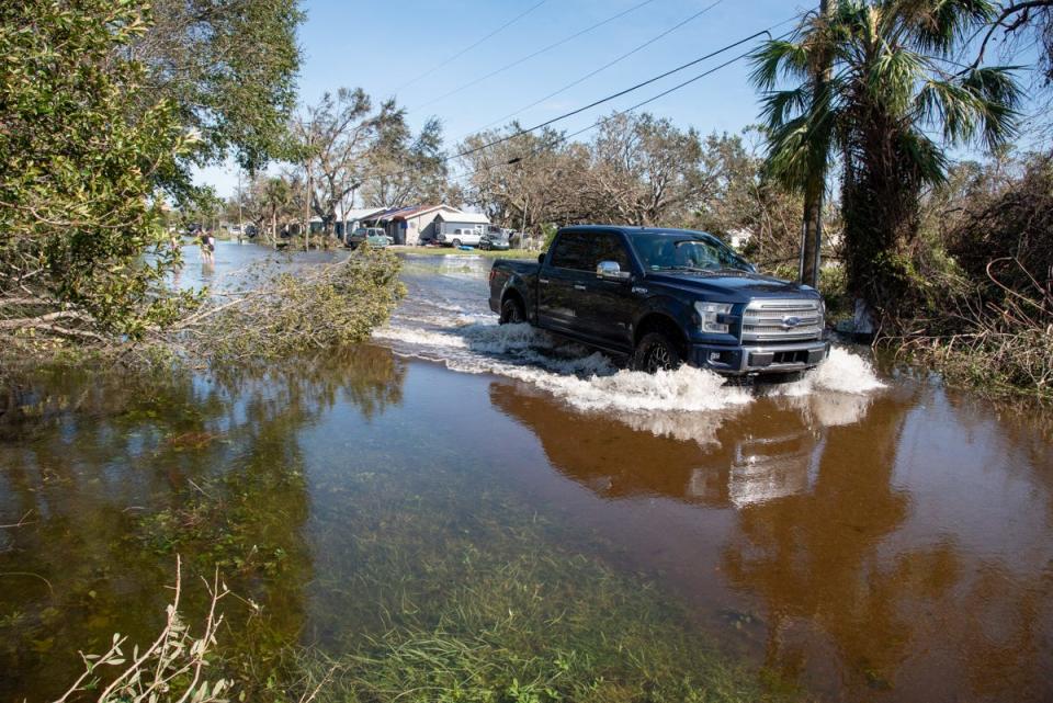 North Port residents used kayaks, canoes, and other small watercraft to retrieve their loved ones from homes flooded by Hurricane Ian.