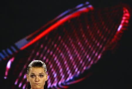 Poland's Agnieszka Radwanska reacts during her semi-final match against Serena Williams of the U.S. at the Australian Open tennis tournament at Melbourne Park, Australia, January 28, 2016. REUTERS/Thomas Peter