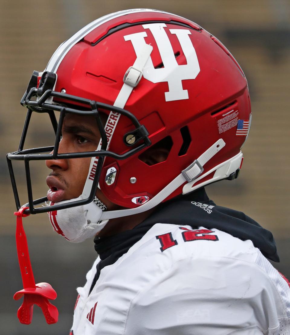 Indiana Hoosiers running back Jaylin Lucas (12) warms up ahead of the NCAA football game against the Purdue Boilermakers, Saturday, Nov. 25, 2023, at Ross-Ade Stadium in West Lafayette, Ind.