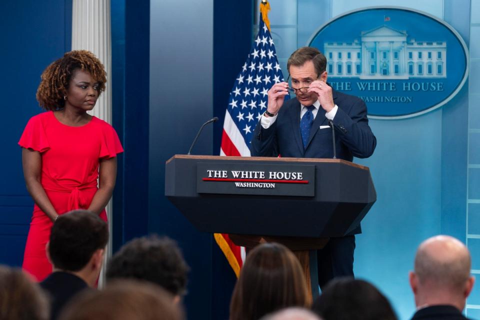 White House press secretary Karine Jean-Pierre listens as White House national security communications adviser John Kirby speaks during a press briefing at the White House in April (AP)