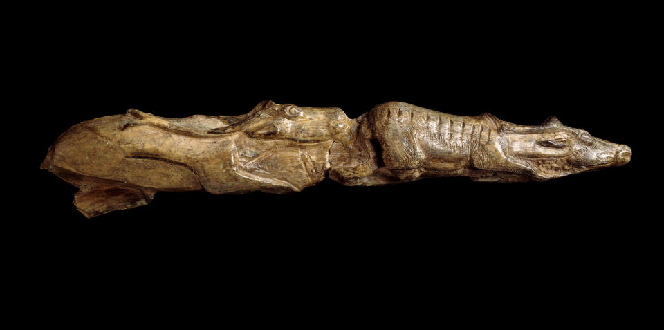 A carving on the tip of a mammoth tusk depicts two reindeer one behind the other; 13,000 years old approximately, Montastruc, France (The Trustees of the British Museum)