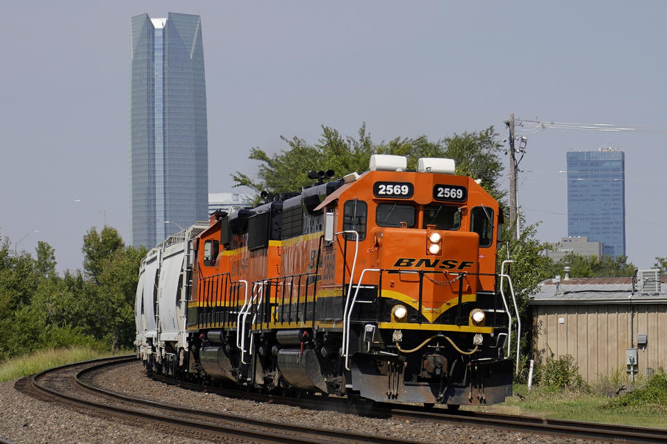 FILE - A BNSF locomotive heads south out of Oklahoma City on Sept. 14, 2022. A former BNSF worker who was named one of the railroad's employees of the year in 2021 for her work in supporting LGBTQ+ workers is now suing the railroad where she worked for 30 years claiming that after being promoted regularly earlier in her career she was denied advancement opportunities after her gender transition. (AP Photo/Sue Ogrocki, File)