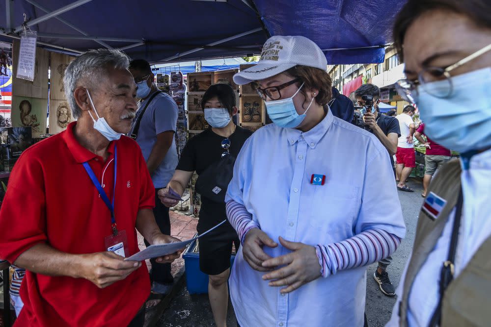 Datuk Christina Liew (centre) during a walkabout at Gaya Street (Sunday Market) in Kota Kinabalu, Sabah September 13, 2020. — Picture by Firdaus Latif