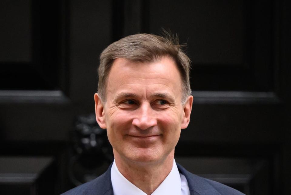 LONDON, ENGLAND - NOVEMBER 22: Chancellor of the Exchequer Jeremy Hunt leaves number 11 Downing Street on November 22, 2023 in London, England. Jeremy Hunt aims to present a growth-focused fiscal plan, leveraging the recent drop in inflation, against the backdrop of Rishi Sunak's speech on Monday, emphasizing the critical choices needed to rejuvenate stagnating economic growth. (Photo by Leon Neal/Getty Images)