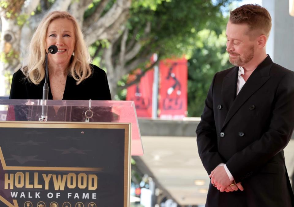 HOLLYWOOD, CALIFORNIA – DECEMBER 01: (L-R) Catherine O’Hara and Macaulay Culkin speak onstage during the ceremony honoring Macaulay Culkin with a Star on the Hollywood Walk of Fame on December 01, 2023 in Hollywood, California. (Photo by Amy Sussman/Getty Images)