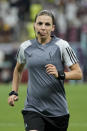 Referee Stephanie Frappart warms up prior to the World Cup group E soccer match between Costa Rica and Germany at the Al Bayt Stadium in Al Khor , Qatar, Thursday, Dec. 1, 2022. (AP Photo/Hassan Ammar)