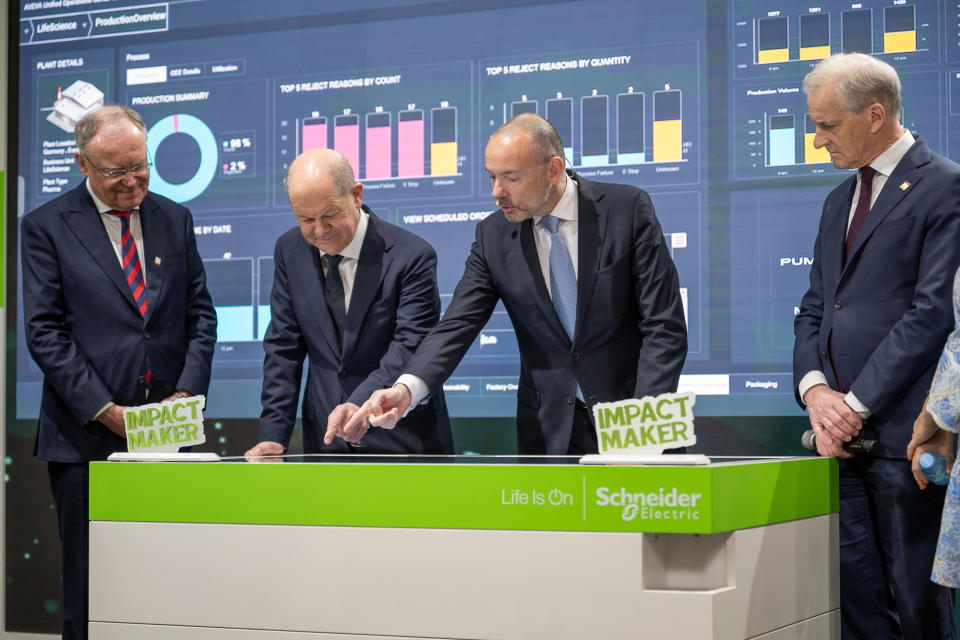 Olaf Scholz, Chancellor of Germany, and Jonas Gahr Støre, Prime Minister of Norway, meeting with Peter Herweck, CEO of Schneider Electric, at the Hannover Messe 2024 event.