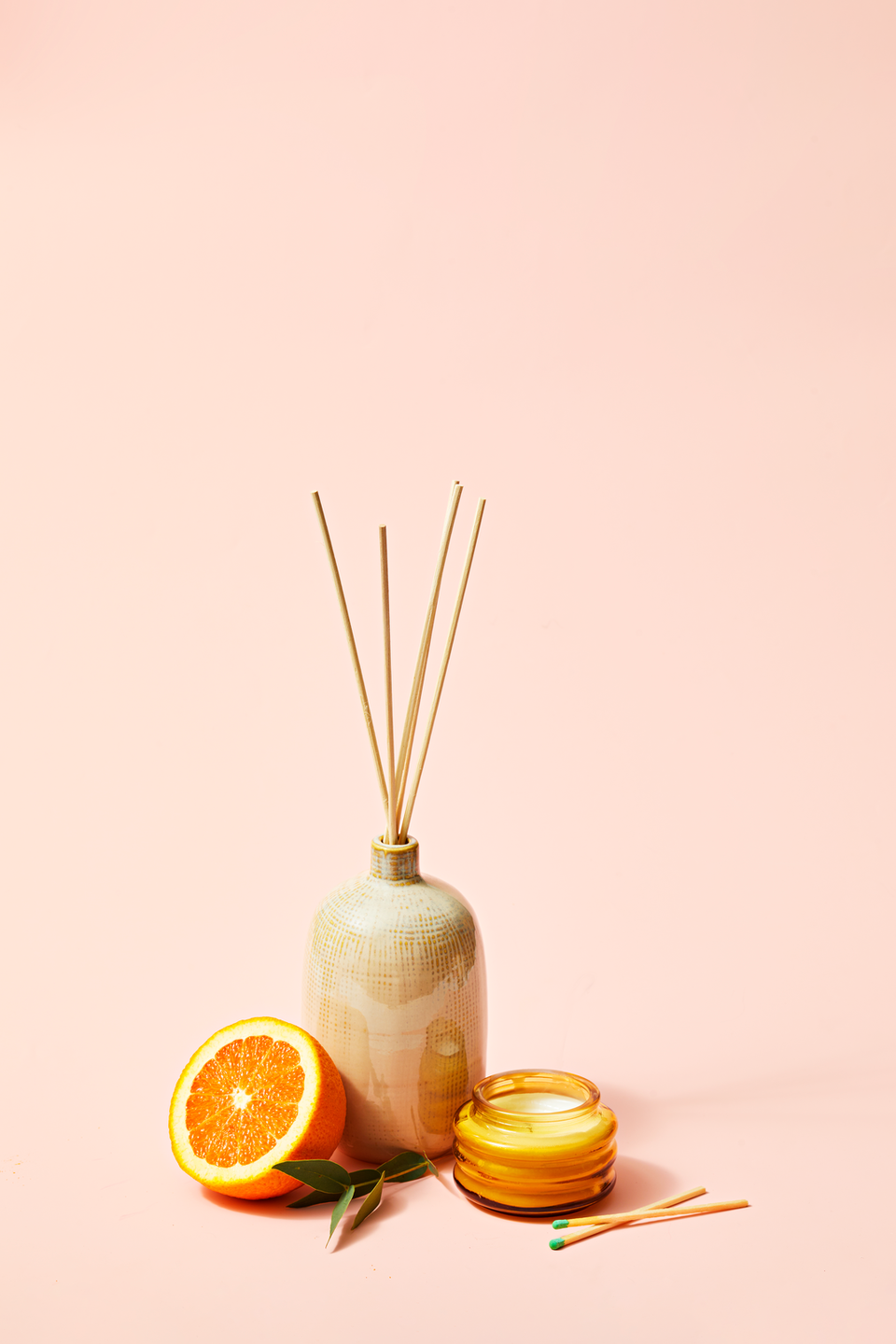 diffuser with orange on pink background
