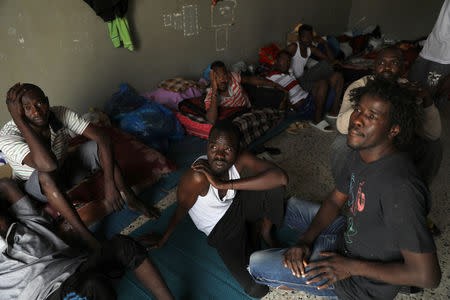 Migrants are seen at the Anti-Illegal Immigration Agency in Tajora shelter center in Tripoli, Libya April 24,2019. REUTERS/Ahmed Jadallah