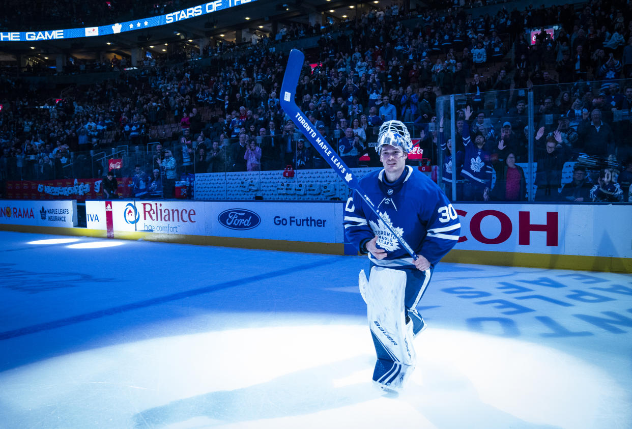 TORONTO, ON - DECEMBER 21: Michael Hutchinson #30 of the Toronto Maple Leafs salutes the crowd after receiving a star of the game after defeating the Detroit Red Wings at the Scotiabank Arena on December 21, 2019 in Toronto, Ontario, Canada. (Photo by Mark Blinch/NHLI via Getty Images)