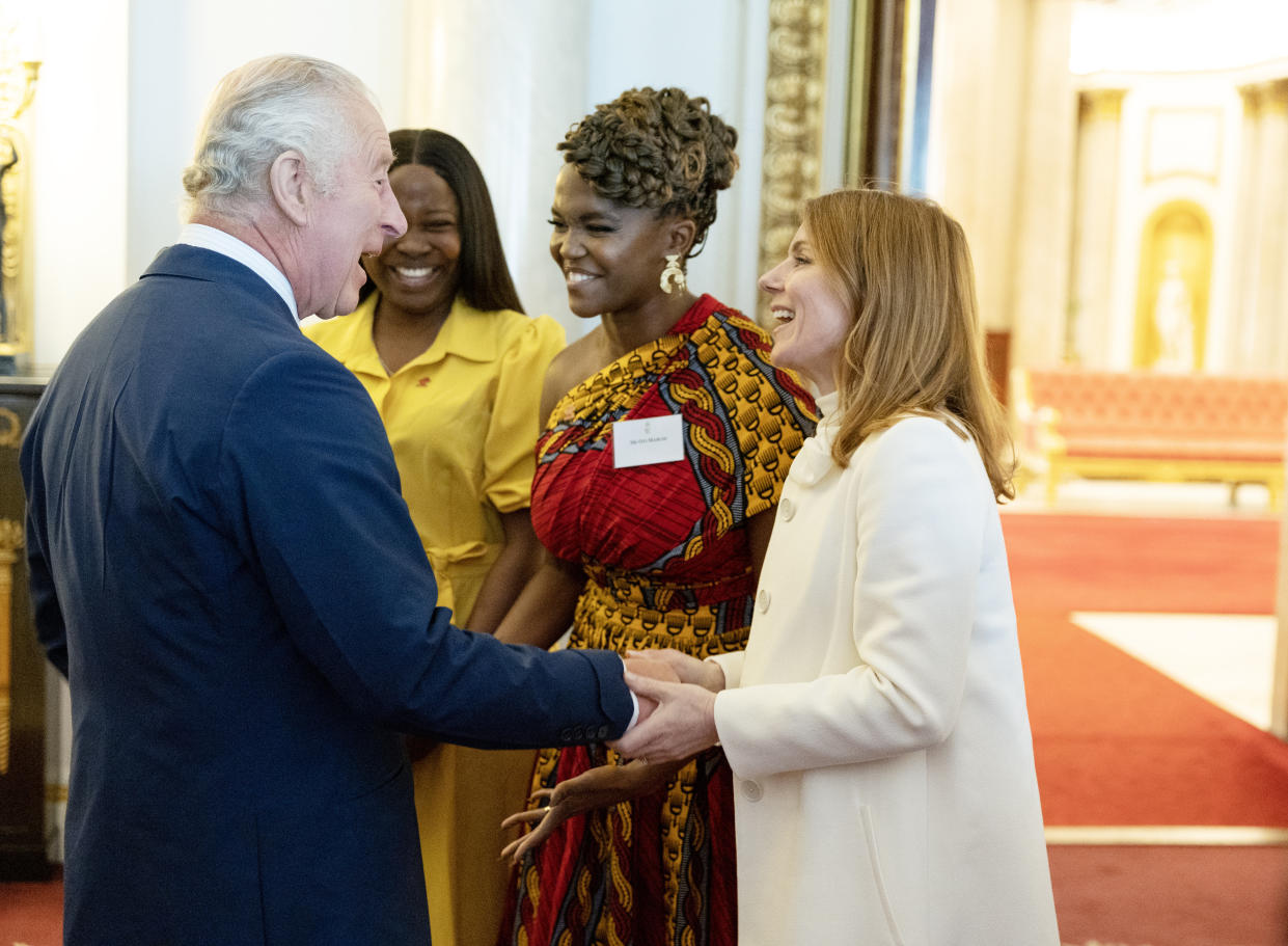 LONDON, ENGLAND - MAY 17: King Charles III meets Geri Horner (R) Oti Mabuse (C) and Funmilola Sosanya (2nd L) as he hosts the winners of the Prince's Trust awards and celebrity ambassadors at Buckingham Palace on May 17, 2023 in London, England. (Photo by Geoff Pugh-WPA Pool/Getty Images)