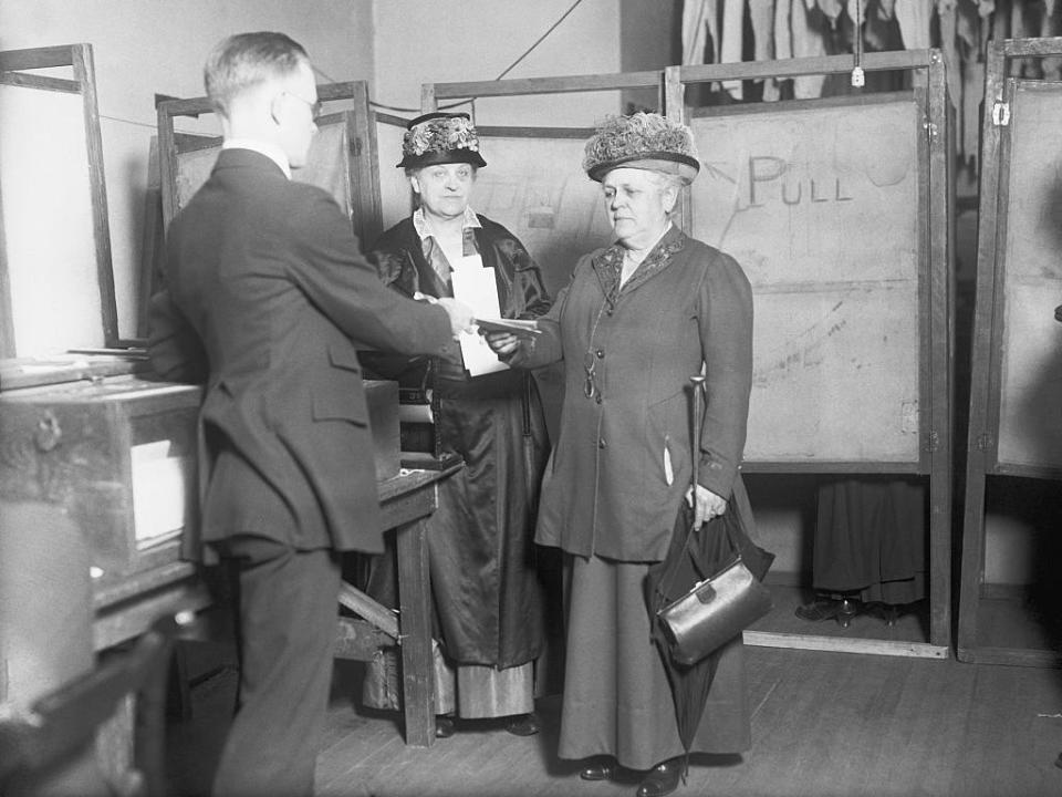 Noted suffrage leaders Carrie Chapman Catt and Mary Garrett Hay cast their votes for president in 1920.