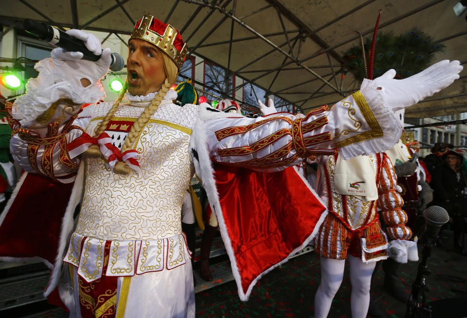 <p>Carnival revellers celebrate during “Weiberfastnacht” (Women’s Carnival) in Cologne, Germany on Feb. 23, 2017, marking the start of a week of street festivals with the highlight “Rosenmontag”, Rose Monday processions. (Photo: Wolfgang Rattay/Reuters) </p>