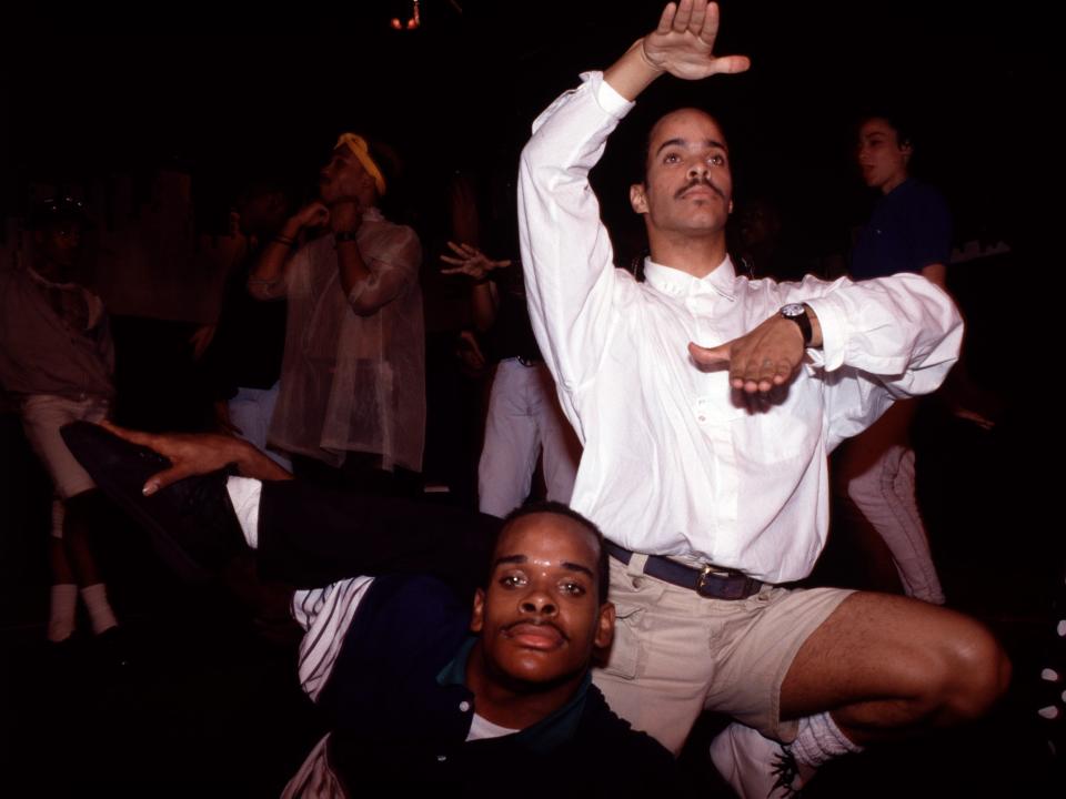 Vogue dancers Derrick Xtravaganza Huggins (bottom) and Cesar Valentino perform at the Copacabana nightclub, New York, New York, May 25, 1989.