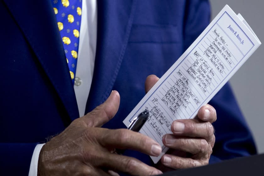 The notes of Democratic presidential candidate former Vice President Joe Biden reference Sen. Kamala Harris, D-Calif., among other things as he speaks at a campaign event at the William "Hicks" Anderson Community Center in Wilmington, Del., Tuesday, July 28, 2020.(AP Photo/Andrew Harnik)