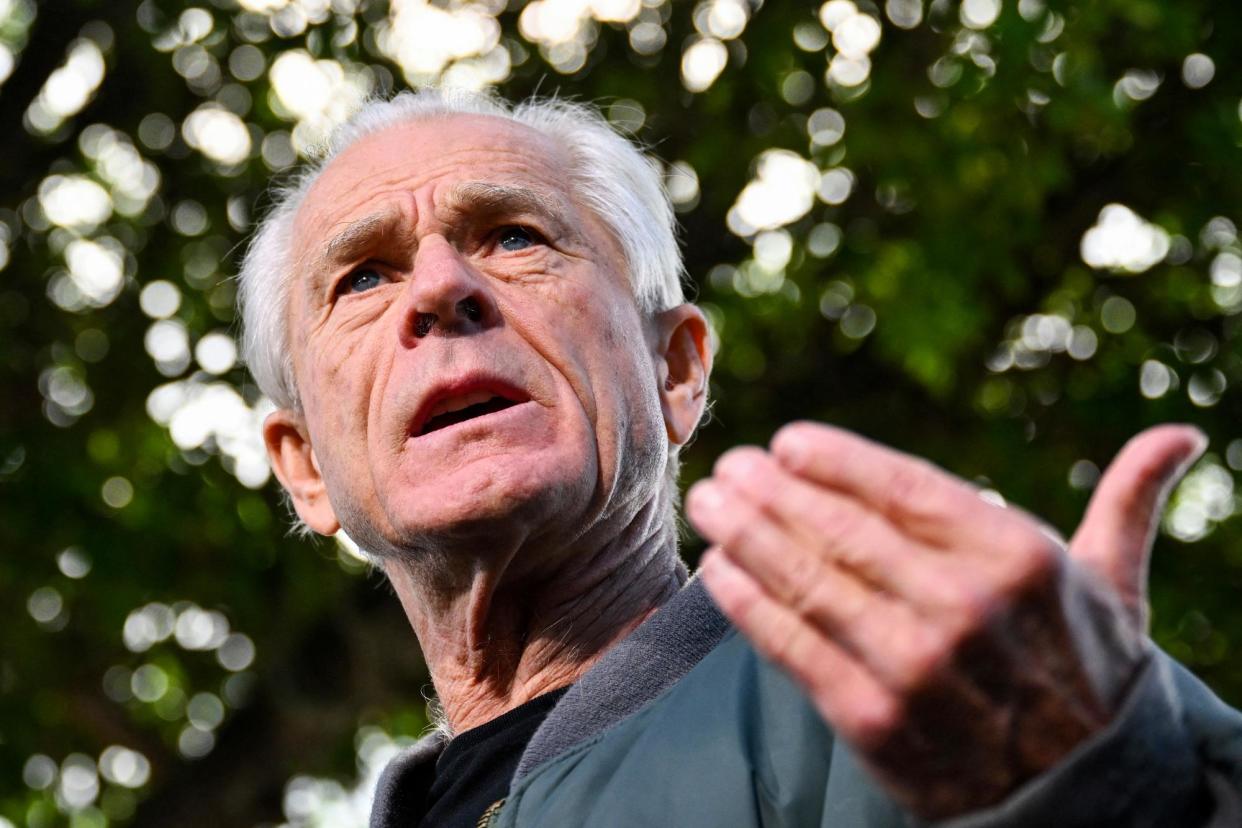 <span>Peter Navarro speaks to the press at the Country Mall Plaza before reporting to the federal prison in Miami, Florida, on Tuesday.</span><span>Photograph: Chandan Khanna/AFP via Getty Images</span>