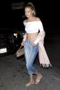 <p>Hadid wears a white Bossa Edessa crop top and two-tone Frame "Le Nouveau" jeans to The Nice Guy in West Hollywood. </p>