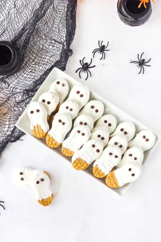 <p>Mama Loves Food</p><p><strong>Get the recipe: <a href="https://www.mamalovesfood.com/ghost-cookies/" rel="nofollow noopener" target="_blank" data-ylk="slk:Nutter Butter Ghost Cookies;elm:context_link;itc:0;sec:content-canvas" class="link ">Nutter Butter Ghost Cookies</a></strong></p>