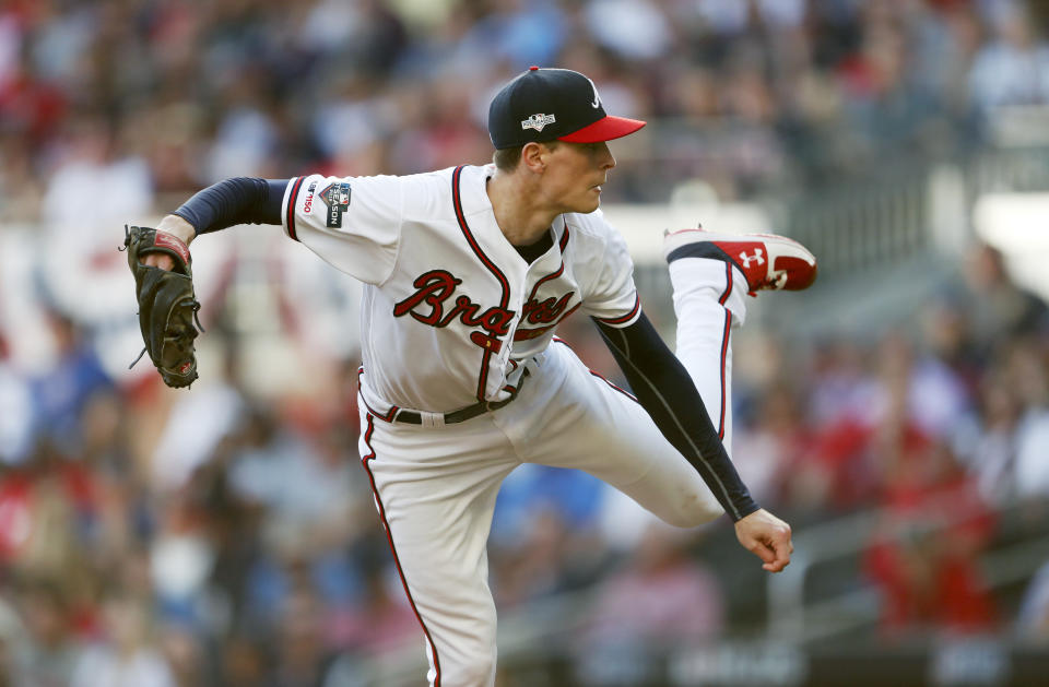 Atlanta Braves pitcher Max Fried throws in the second inning of Game 5 of their National League Division Series baseball game against the St. Louis Cardinals, Wednesday, Oct. 9, 2019, in Atlanta. (AP Photo/John Bazemore)