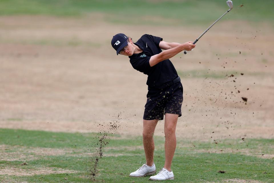 CJ Phillips of Edmond Santa Fe High School hits from the 10th fairway during the final round of the 6A Boys Golf State Championship at Bailey Ranch Golf Glub Tuesday, May 9, 2023 in Owasso, Ok.