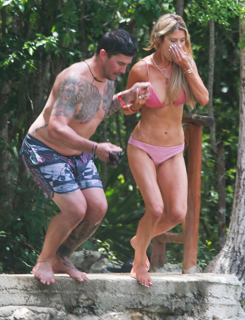 <p>The adventurous pair also dove into a natural swimming hole during their vacation in Tulum, Mexico.</p>