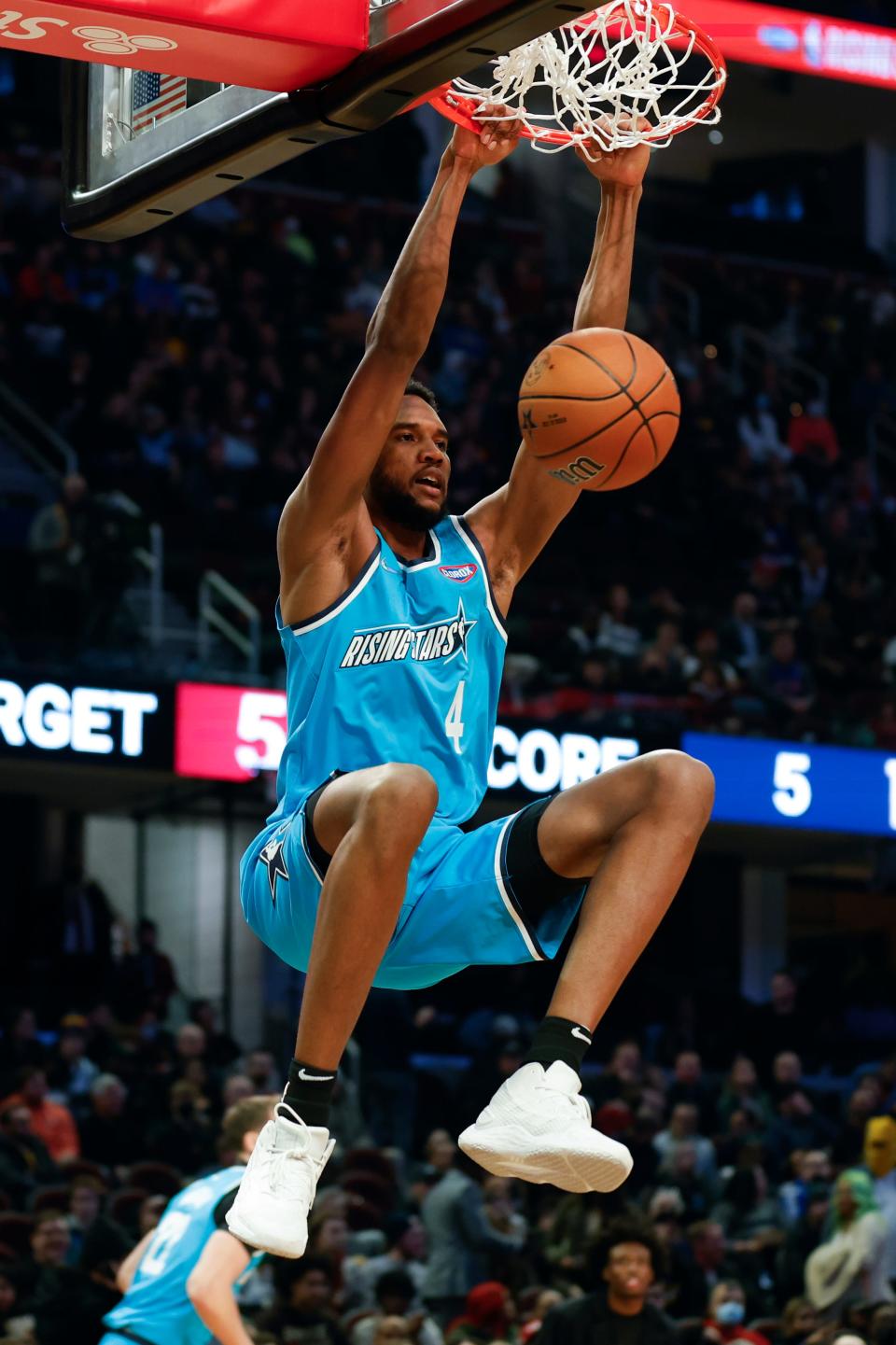 Evan Mobley of the Cavaliers dunks during a semifinal of the NBA All-Star Weekend's Rising Stars Challenge, Friday, Feb. 18, 2022, in Cleveland.