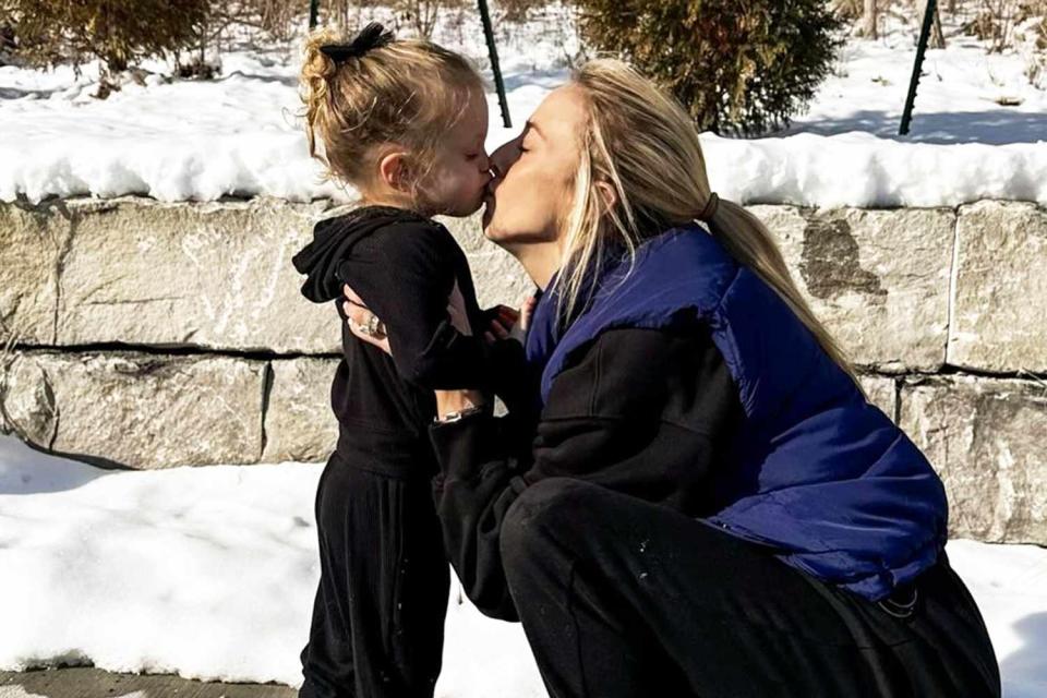 <p>Brittany Mahomes/Instagram</p> Brittany Mahomes and her daughter Sterling share a kiss.