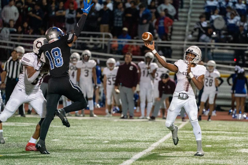 Clifton's Romelo Tables (1) throws a pass during the NJSIAA North 1, Group 5 semifinal between Clifton and Passaic Tech at Passaic County Technical Institute in Wayne, NJ on Friday, November 4, 2022.