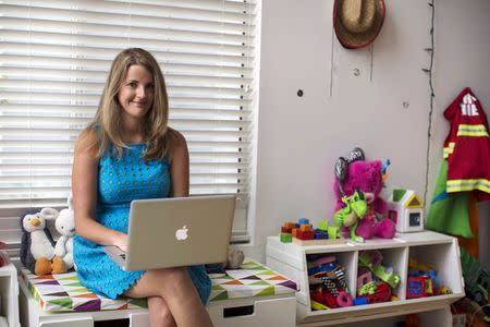 Chief executive of California-based social and educational group for parents Club MomMe Rachel Pitzel poses for a picture at her home in Playa Vista, California, June 10, 2015. REUTERS/Mario Anzuoni