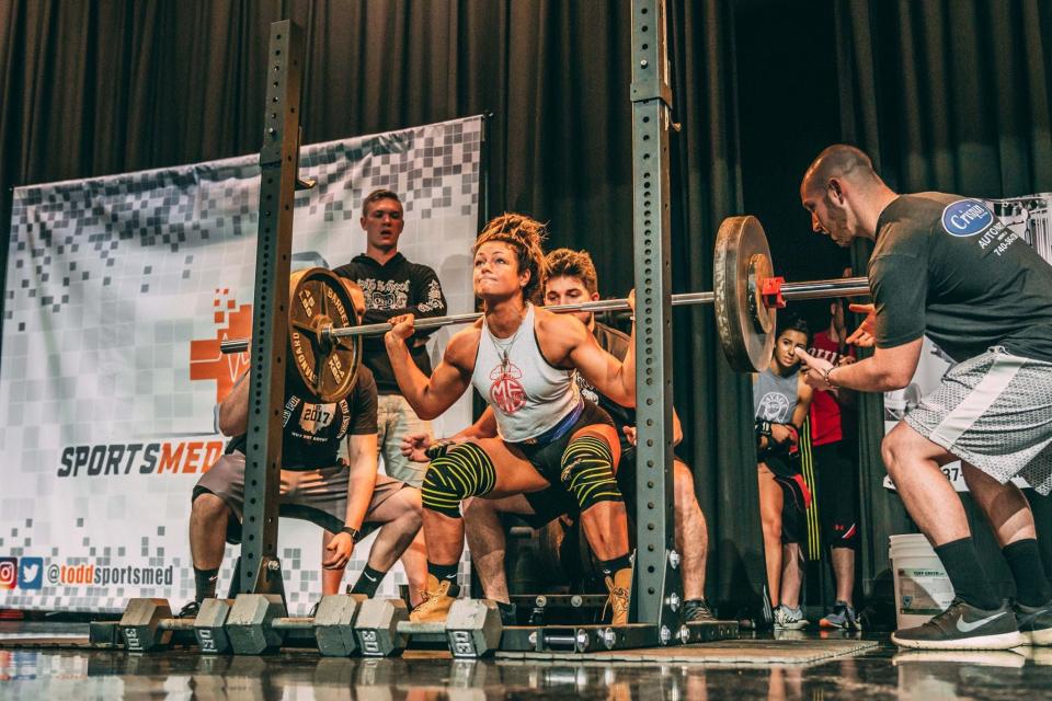 Kelsey Lensman, a North Canton Hoover High graduate, participates in a lifting competition. She is undertaking a fitness challenge dubbed Mission48, participating in 48 fitness competitions in 48 states in 48 days.