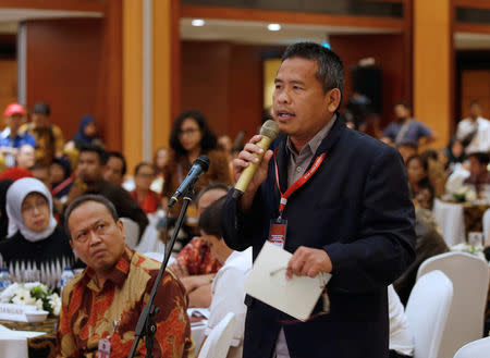 Former Indonesian militant Ali Fauzi Manzi, brother of Bali bombing militant Amrozi, speaks during a meeting between former militants and victims in Jakarta, Indonesia, February 28, 2018. REUTERS/Beawiharta