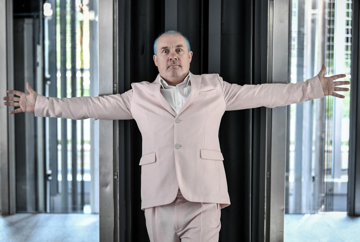 British artist Damien Hirst poses during the press visit of an exhibition entitled 'Cherry Blossoms' dedicated to his work, on July 2, 2021 at the Fondation Cartier in Paris. (Photo by STEPHANE DE SAKUTIN / AFP) (Photo by STEPHANE DE SAKUTIN/AFP via Getty Images)