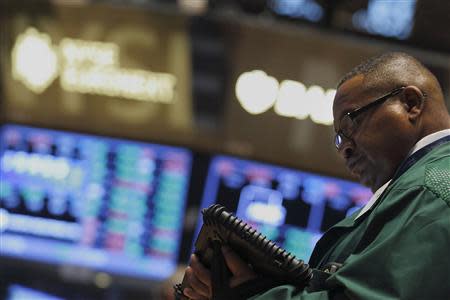 A trader works on the floor of the New York Stock Exchange August 26, 2013. REUTERS/Brendan McDermid