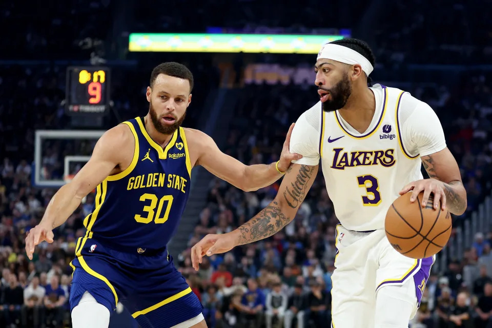 Stephen Curry and Anthony Davis were both selected as All-Star game reserves.  (Ezra Shaw/Getty Images)