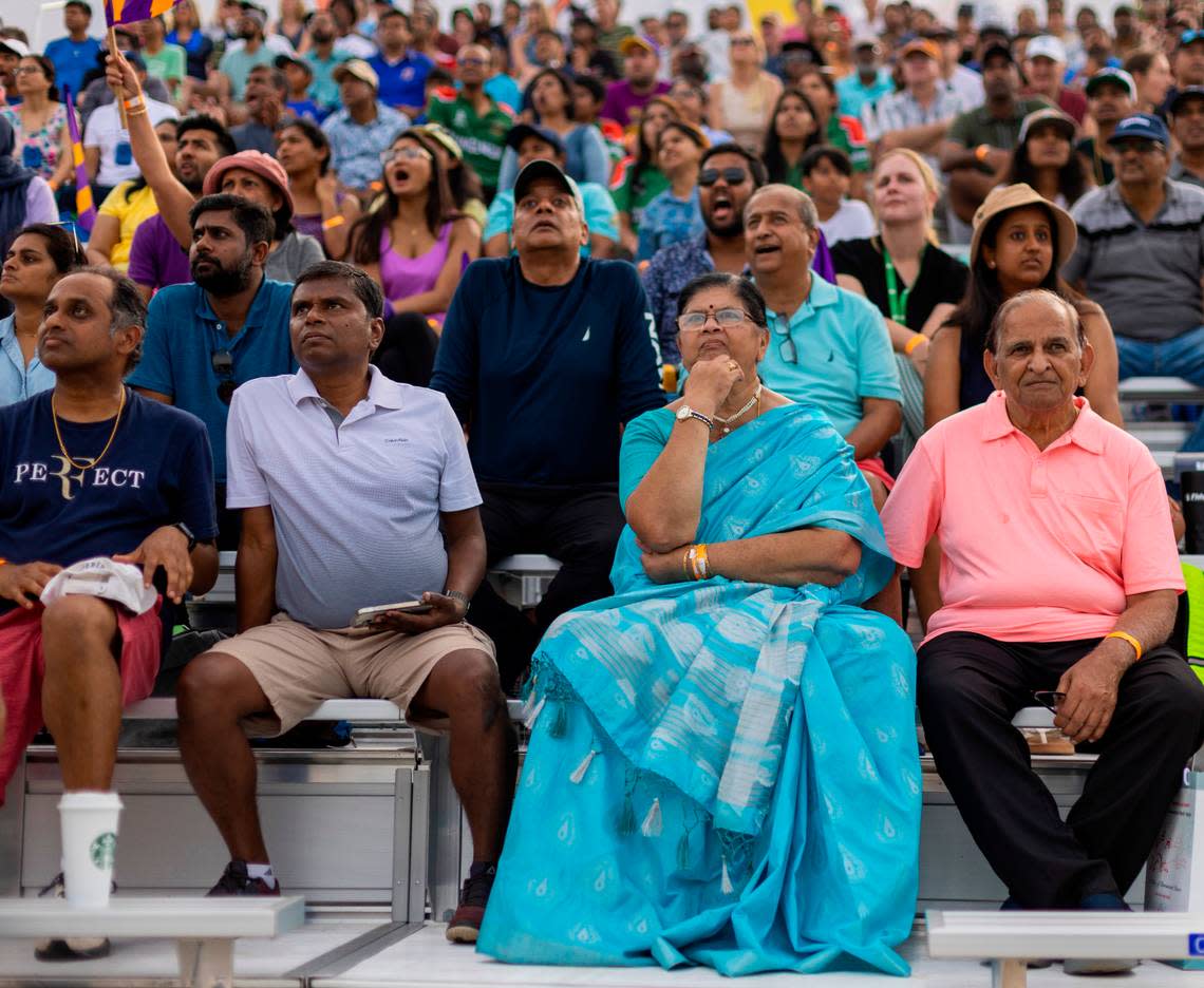 Dressed in a traditional sari, Dr. Rohini Rao of Morrisville, watches the Major League Cricket match between the Washington Freedom and the LA Knight Riders on Thursday, July 20, 2023 at Church Street Park in Morrisville, N.C.